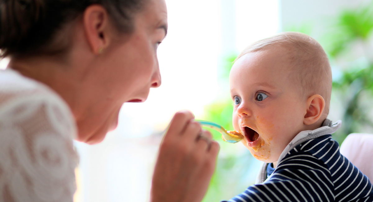 Mother feeding baby